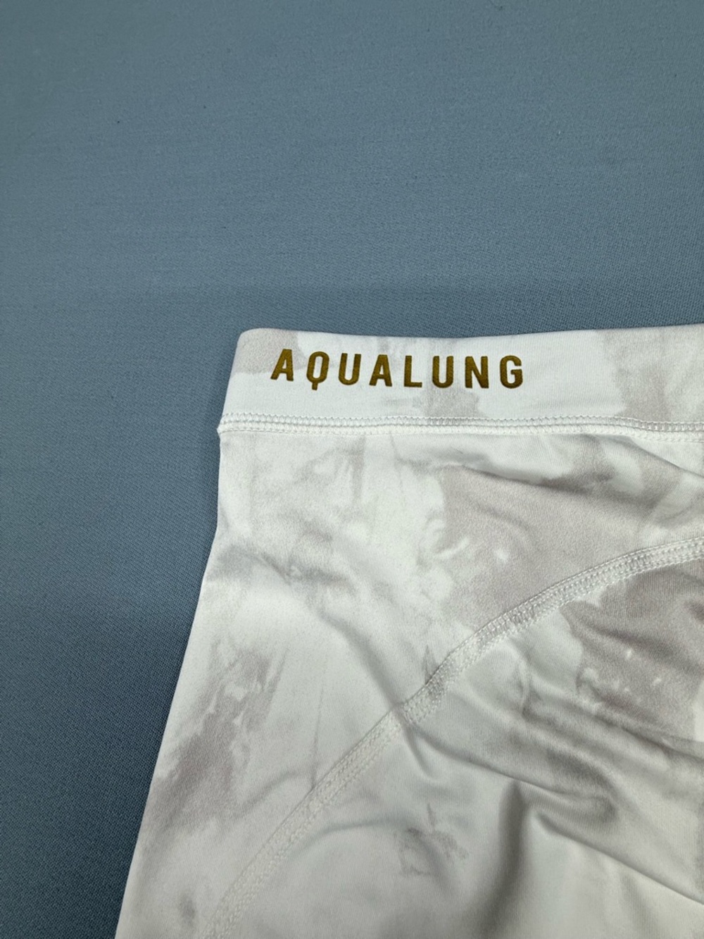 Aqualung White Tie-Dye Active Leggings with Gold Emblem - Picture 6 of 6